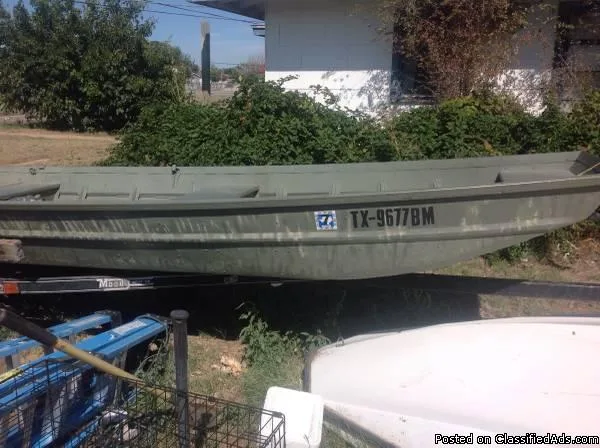 Flatbottom boat for sale with 6.0 Johnson motor and trolling mot