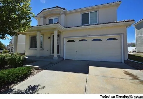 home is located in Green Valley Ranch with a massive floor plan