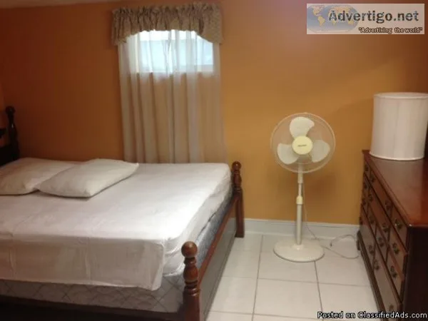 Furnished room in private home. Utilities Included. Walk to Q5 b