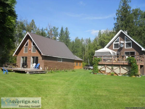Large family home and smaller home on sweeping yard wth oversize
