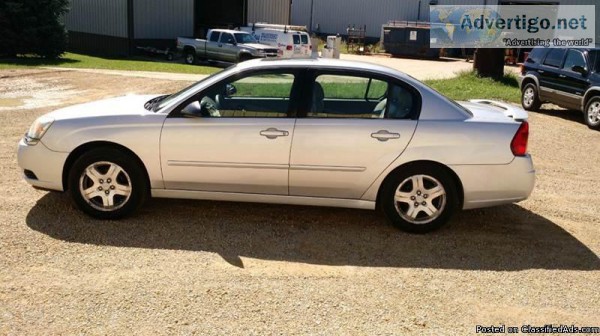 2004 Malibu with Good tires a good history report and a V6.