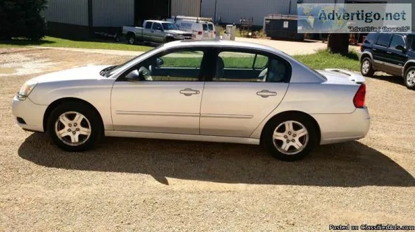 2004 Malibu with Good tires a good history report and a V6.