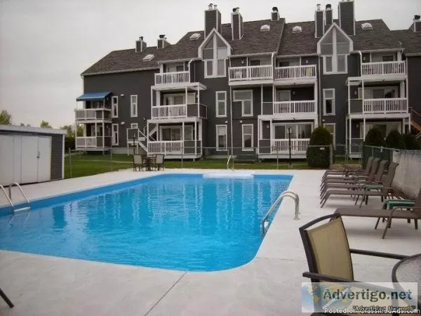 Condo 2 cac face &agrave la plage et au lac &agrave Magog