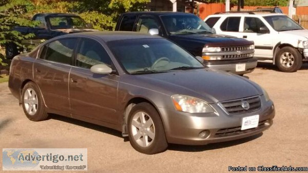 2003 Nissan Altima  1000. Down 