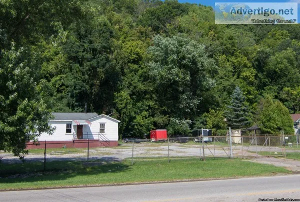 Large Fenced and secure lot for storing rvs boats cars etc..
