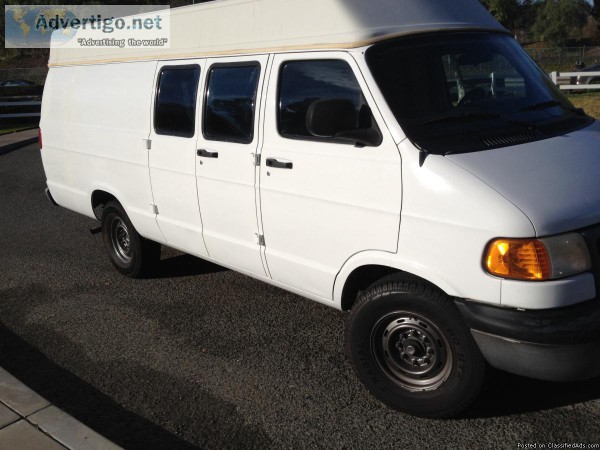 03 doge cargo van extra long extended roof with lift in the back