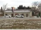 Hartland Twp Great location right on M-59 less than one