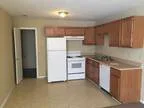 This Three BR One BA features a rare Two car garage.