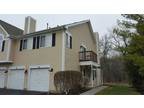 Woodstock Two BR One BA This sizable end unit in The Trees is a