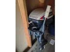 14  boat motor and trailer (West Bend)