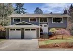 Redmond Four BR One BA Dramatic remodel on a quiet loop road.