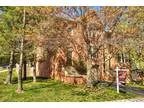 Beautiful 2-sides brick end-unit home wtons of high-end upgrades