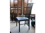 Four black lacquerleather chairs dining chairs