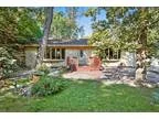 Woodstock Two BR 2.5 BA Convenient ranch home on partially