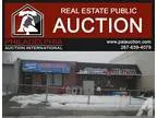 Commercial building sale by auction