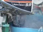 Johnson 15hp outboard with a 9.9 Hood -