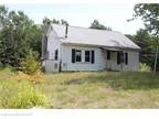 Casco One BA Large Four BR home nestled on over 2 acres.