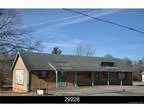 Iron Station Commercial Property. Building is in need of
