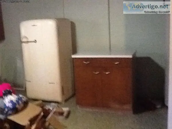 Vintage Refrigerator and Cabinet.
