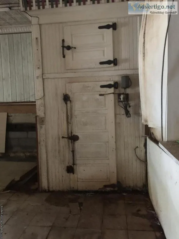 Antique wooden walk-In Meat cooler front
