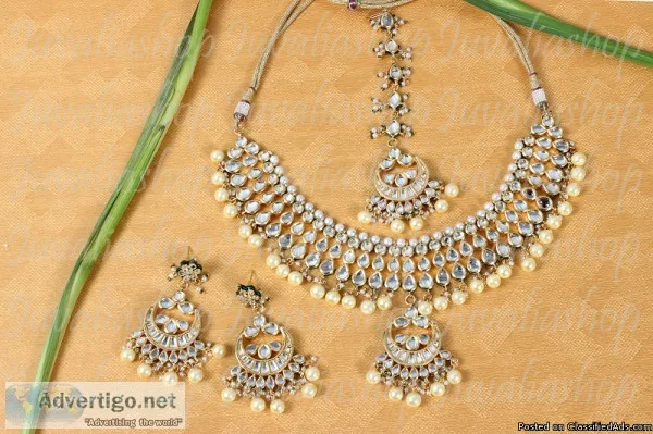 Designer kundun maang tikka set by juvaliashop