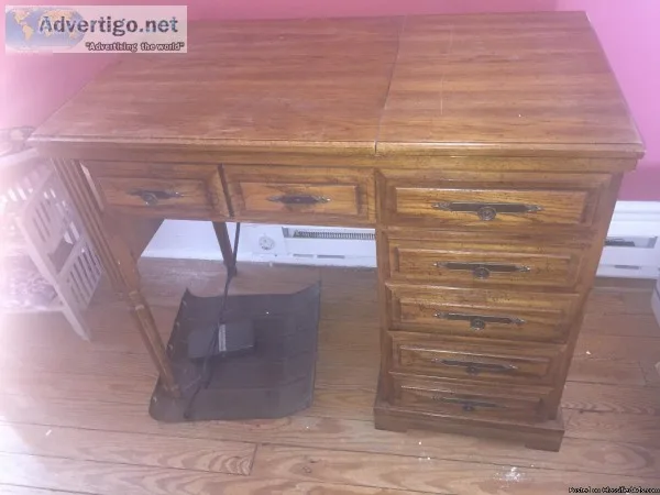 Sewing machine in cabinet