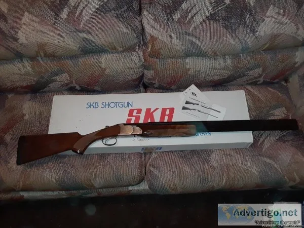 SKB 785 Sporting Clays 12 ga. OU and 7 chokes