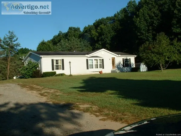 Home and 2 acres on country setting