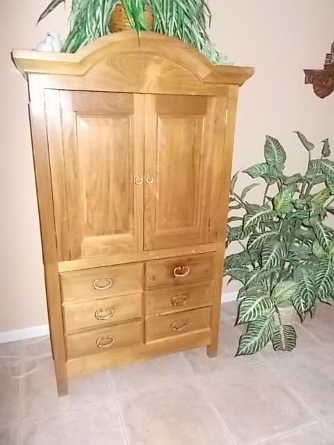 TV Armoire with  6 drawers.