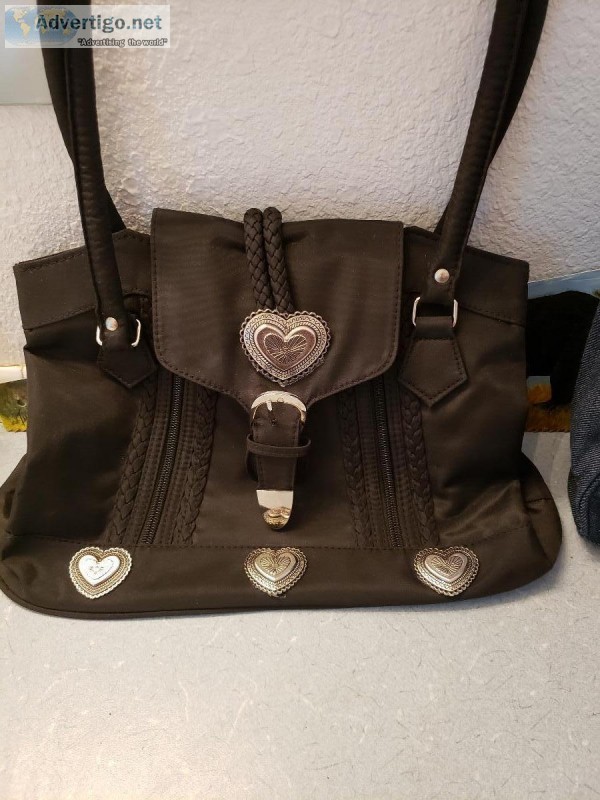 A new purse with jewelry in it