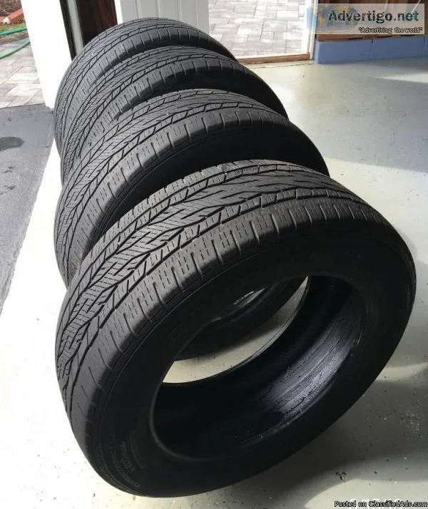 Four (used) CONTINENTAL 275-55 R20 TIRES