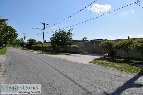 Large fenced yard with office