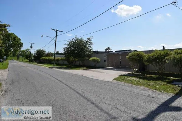Large fenced yard with office