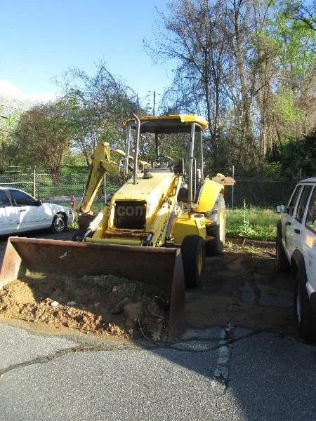 2002 New Holland 555E Backhoe