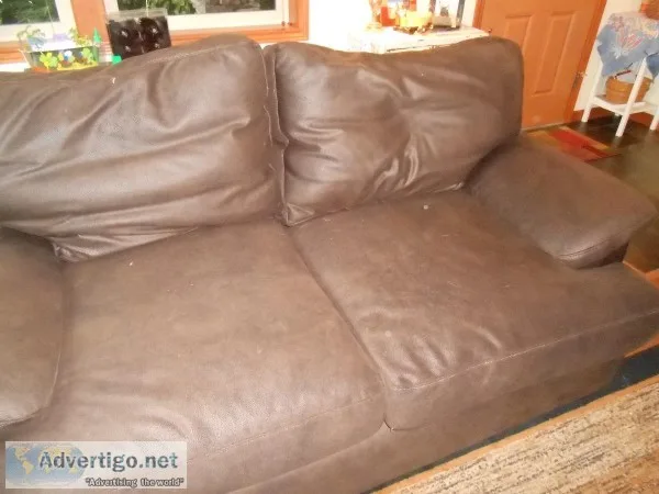 Comfy brown leather gently used couch
