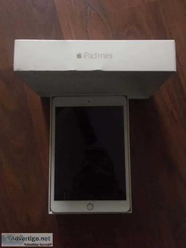 Apple iPad mini 3 64GB gold color with glass screen protector.