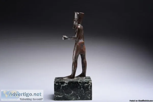 A large bronze figure of the Great Theban King of the Gods Amun