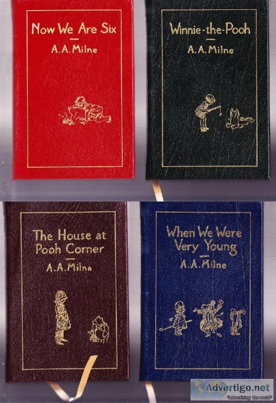 SET  OF  4  WINNIE  THE  POOH LEATHER BOUND BOOKS