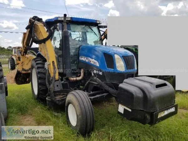 2006 New HollandFord TS115A Tractor with Alamo Boom Attachment