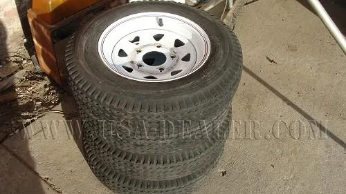4 - TOW-MASTER 5.30-12 TIRES AND RIMS