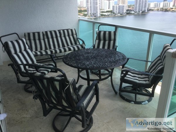 Patio table chairs and 3 seater swing couch