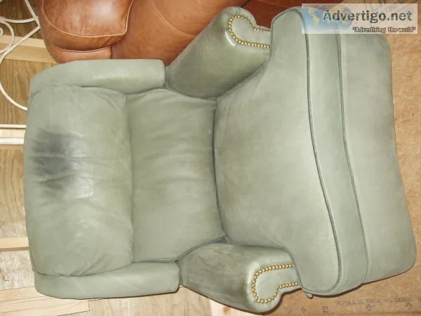 Genuine Leather Swivel RockerRecliner at a Bargain Price