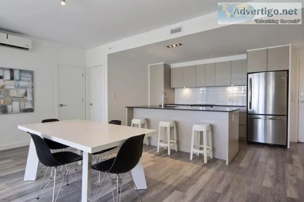 Semi-furnished apartment  hot water and gym included  competitif
