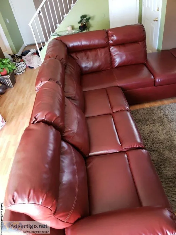 Sectional recliner sofa with storage bin