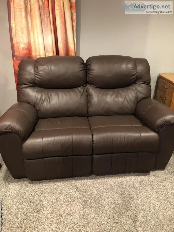 Leather reclining love seat