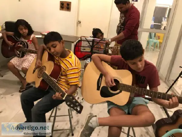 Guitar classes for adults and children in trimulgherry secundera