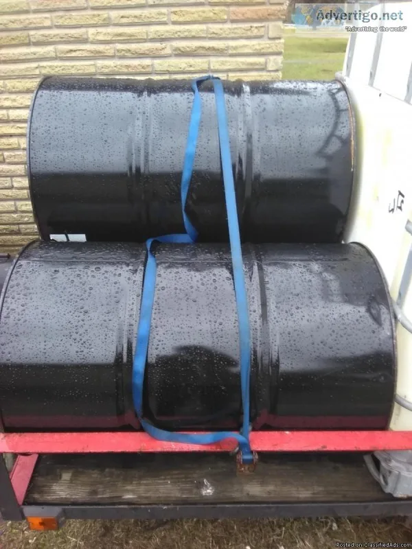 55 gallon black steel drums.