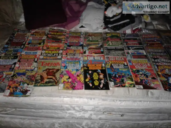 Over 80 comic books all the suicide squad ones n old Tarzan ones