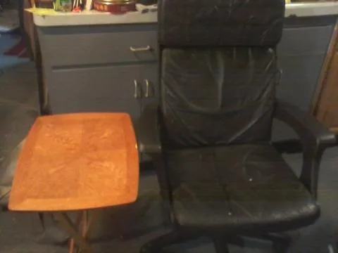 Swivel chair made in Italy with oak folding table