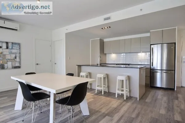 Semi-furnished apartment  hot water and gym included  competitif